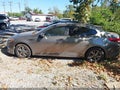 2016 Kia Optima — photo 14 of 15 | VIN 5XXGT4L13GG041278