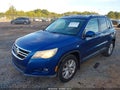 2009 Volkswagen Tiguan — photo 2 of 13 | VIN WVGAV75NX9W004727