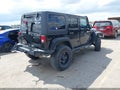 2016 Jeep Wrangler Unlimited — photo 4 of 18 | VIN 1C4BJWEGXGL127927
