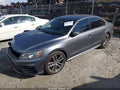 2018 Volkswagen Passat — photo 2 of 16 | VIN 1VWAA7A39JC025415