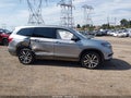 2017 Honda Pilot — photo 13 of 16 | VIN 5FNYF6H07HB012488