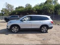 2017 Honda Pilot — photo 14 of 16 | VIN 5FNYF6H07HB012488
