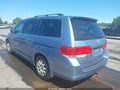 2010 Honda Odyssey — photo 3 of 11 | VIN 5FNRL3H44AB043282