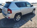 2014 Jeep Compass — photo 4 of 11 | VIN 1C4NJCBA7ED573018