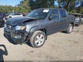 2013 Honda Ridgeline — photo 2 of 16 | VIN 5FPYK1F51DB003669