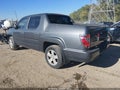 2013 Honda Ridgeline — photo 3 of 16 | VIN 5FPYK1F51DB003669
