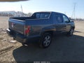 2013 Honda Ridgeline — photo 4 of 16 | VIN 5FPYK1F51DB003669