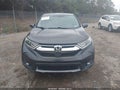 2018 Honda CR-V — photo 12 of 16 | VIN 2HKRW2H50JH699698