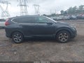 2018 Honda CR-V — photo 13 of 16 | VIN 2HKRW2H50JH699698