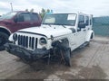 2015 Jeep Wrangler Unlimited — photo 2 of 16 | VIN 1C4BJWEG9FL526505
