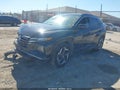 2022 Hyundai Tucson — photo 2 of 16 | VIN 5NMJFCAE0NH102937