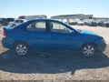 2009 Kia Spectra — photo 13 of 16 | VIN KNAFE221595620918