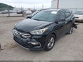 2017 Hyundai Santa Fe — photo 2 of 17 | VIN 5NMZU3LB4HH030351