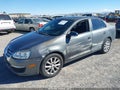 2010 Volkswagen Jetta — photo 2 of 11 | VIN 3VWRX7AJ0AM122890