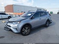 2018 Toyota RAV4 — photo 2 of 20 | VIN 2T3ZFREVXJW515650