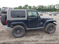 2009 Jeep Wrangler — photo 13 of 16 | VIN 1J4FA54109L729029