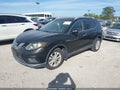 2015 Nissan Rogue — photo 2 of 11 | VIN 5N1AT2ML9FC785407