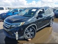 2017 Honda Pilot — photo 6 of 16 | VIN 5FNYF5H39HB041706