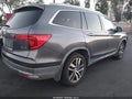 2017 Honda Pilot — photo 4 of 18 | VIN 5FNYF6H01HB015774