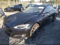 2017 Tesla Model S — photo 2 of 22 | VIN 5YJSA1E28HF223745