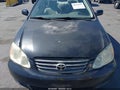 2003 Toyota Corolla — photo 6 of 11 | VIN 1NXBR32E83Z018098