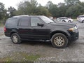2014 Ford Expedition — photo 13 of 16 | VIN 1FMJU2A54EEF11750