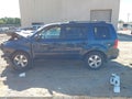 2010 Honda Pilot — photo 15 of 17 | VIN 5FNYF4H64AB016593