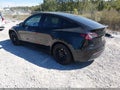 2022 Tesla Model Y — photo 3 of 14 | VIN 7SAYGAEE6NF322792