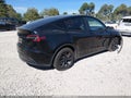 2022 Tesla Model Y — photo 4 of 14 | VIN 7SAYGAEE6NF322792