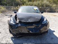 2022 Tesla Model Y — photo 6 of 14 | VIN 7SAYGAEE6NF322792