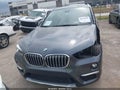 2019 BMW X1 — photo 12 of 17 | VIN WBXHU7C51K3H44690