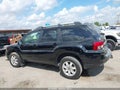 2011 Mitsubishi Endeavor — photo 14 of 16 | VIN 4A4JM2AS1BE035715