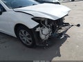 2014 Mazda 3 — photo 13 of 16 | VIN JM1BM1U78E1149235