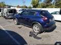 2015 Nissan Juke — photo 3 of 13 | VIN JN8AF5MRXFT510473
