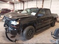 2018 Chevrolet Silverado 1500 — photo 2 of 16 | VIN 3GCUKREC7JG299423