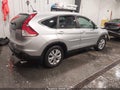 2013 Honda CR-V — photo 4 of 18 | VIN 2HKRM4H71DH636570