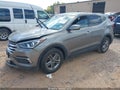 2018 Hyundai Santa Fe — photo 2 of 16 | VIN 5NMZT3LB5JH079440