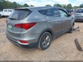 2018 Hyundai Santa Fe — photo 4 of 16 | VIN 5NMZT3LB5JH079440