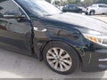 2016 Kia Optima — photo 6 of 16 | VIN 5XXGU4L36GG095415