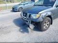 2009 Nissan Frontier — photo 6 of 16 | VIN 1N6AD06W19C421108