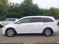 2014 Honda Odyssey — photo 14 of 18 | VIN 5FNRL5H49EB047216