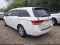 2014 Honda Odyssey — photo 3 of 18 | VIN 5FNRL5H49EB047216