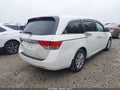 2014 Honda Odyssey — photo 4 of 18 | VIN 5FNRL5H49EB047216