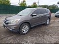 2015 Honda CR-V — photo 2 of 16 | VIN 2HKRM3H74FH504898
