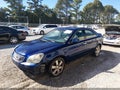 2007 Kia Optima — photo 2 of 12 | VIN KNAGE123975159431