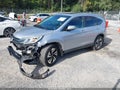 2016 Honda CR-V — photo 2 of 16 | VIN 5J6RM4H99GL033104