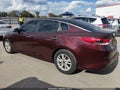 2018 Kia Optima — photo 14 of 20 | VIN 5XXGT4L32JG209971