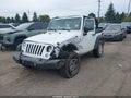 2018 Jeep Wrangler — photo 2 of 16 | VIN 1C4AJWAG5JL818551