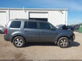 2010 Honda Pilot — photo 13 of 16 | VIN 5FNYF4H59AB014409