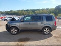 2010 Honda Pilot — photo 14 of 16 | VIN 5FNYF4H59AB014409